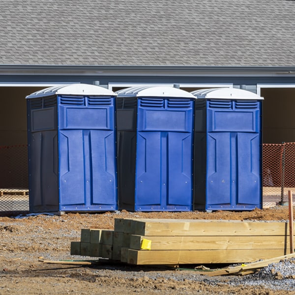 what is the cost difference between standard and deluxe porta potty rentals in Davenport Center